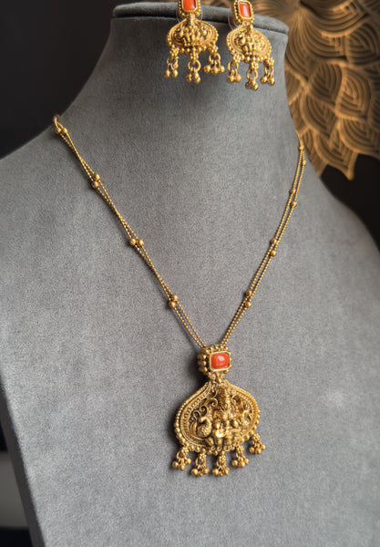 Panoply South Indian Lakshmi Mid length Pendant Necklace | Lightweight Temple Jewelry with Coral Accent & Earrings
