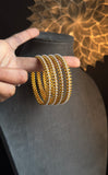 Set of 4 Pearl Look-Alike Bangles - BUDGET