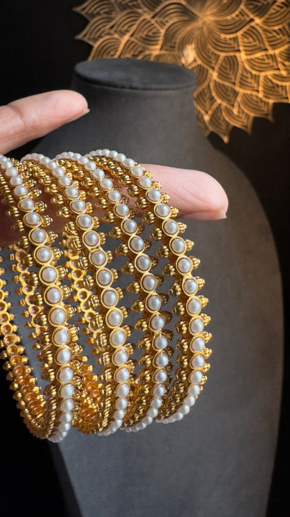 Set of 4 Pearl Look-Alike Bangles - BUDGET