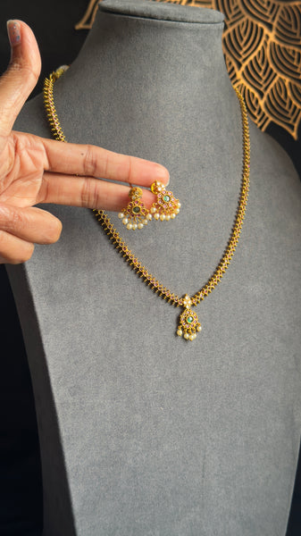 Long Haar ruby stone gold necklace with earrings